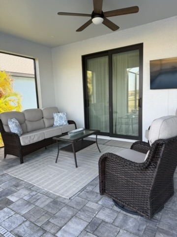 Covered patio outdoor seating with ceiling fan