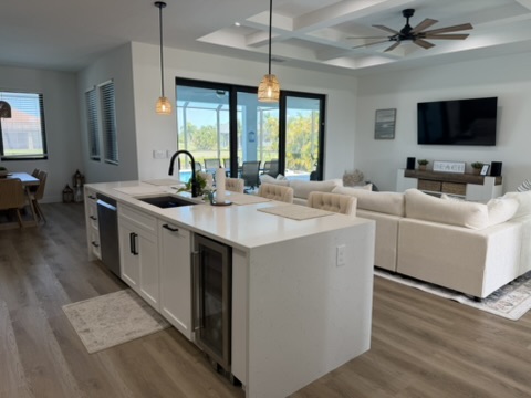 Kitchen island with quartz countertop and wine fridge