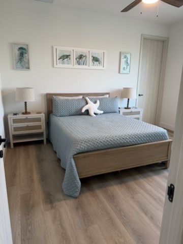 Guest bedroom with coastal decor and starfish pillow