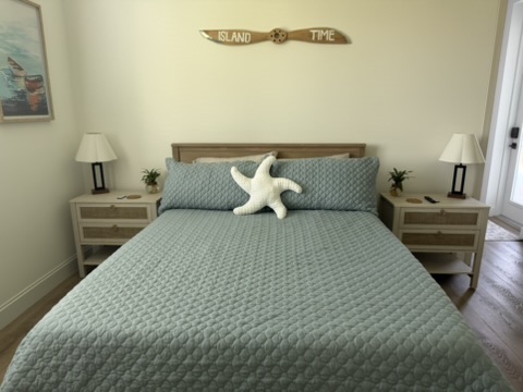 Guest bedroom with Island Time sign